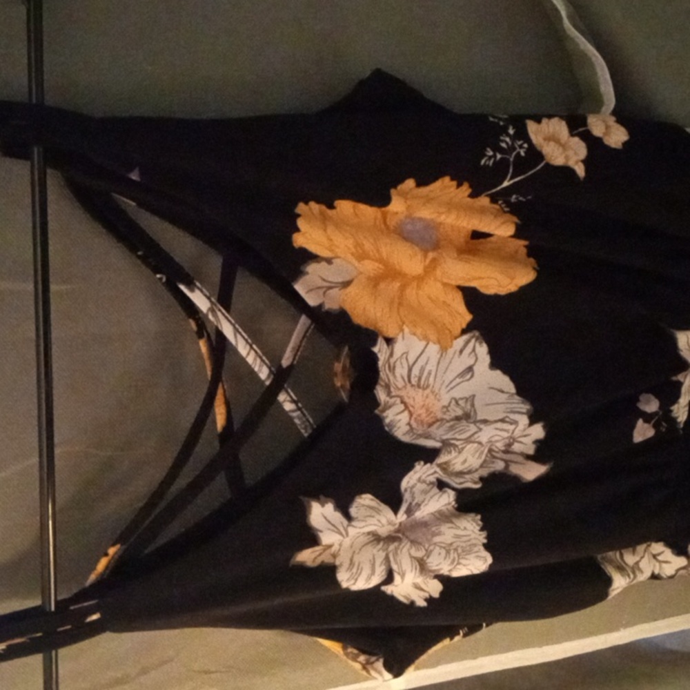 Maurice’s Jumpsuit- S Floral black with yellow & white flowers New With Tags.